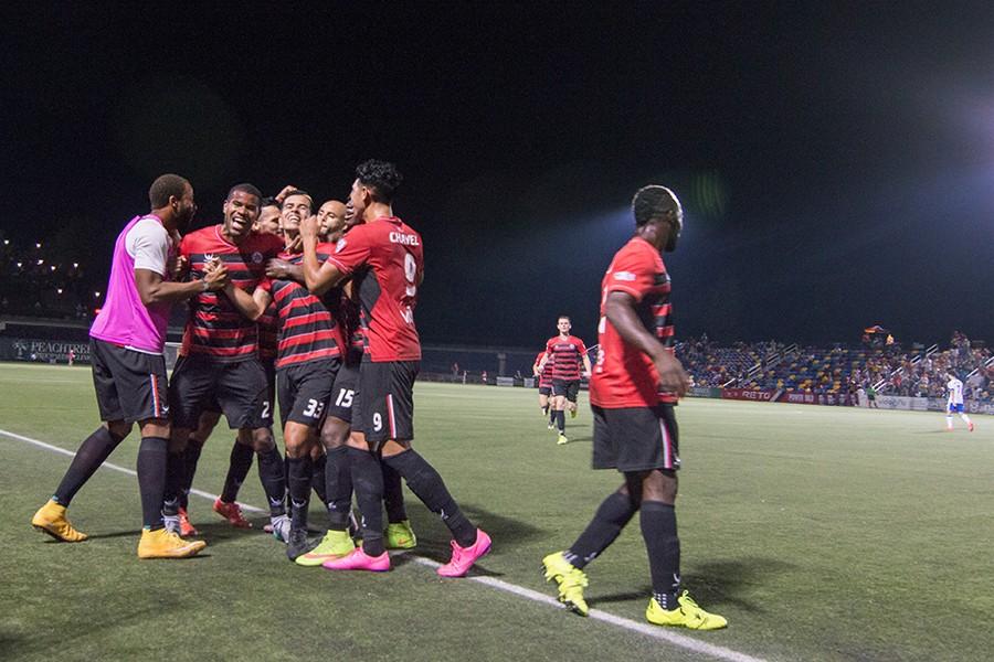 The Atlanta Silverbacks celebrate a late goal by Junior Burgos to win the match. The Silverbacks defeated FC Edmonton by a score of 1-0 on Aug. 29, 2015.